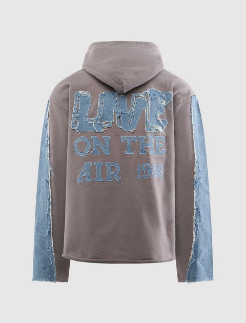 Gray hooded streetwear sweatshirt with blue denim sleeves and Live On The Air 1988 text on back