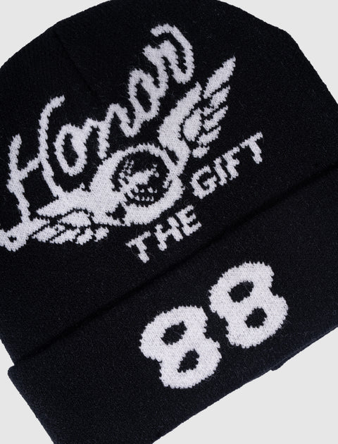 Black knit beanie with white Honor The Gift logo and number 88 on the cuff