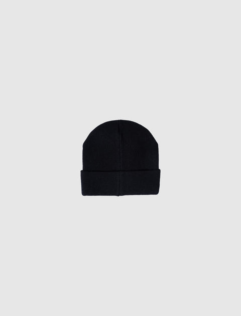 Black cuffed beanie hat on a plain grey background, men's streetwear accessory