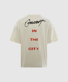 Back view of cream streetwear t-shirt with 'Concert in the City' graphic text.
