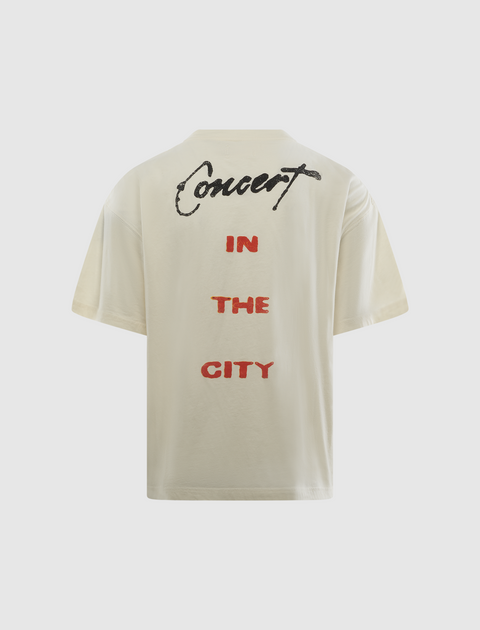 Back view of cream streetwear t-shirt with 'Concert in the City' graphic text.
