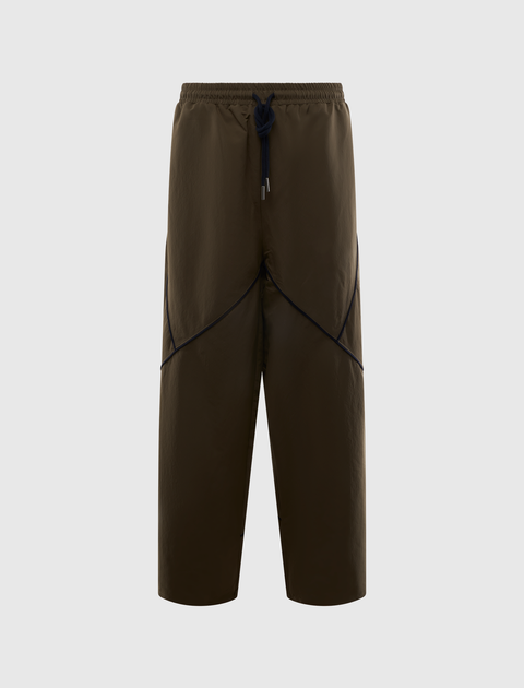 Brown nylon streetwear pants with black drawstring and unique panel detailing