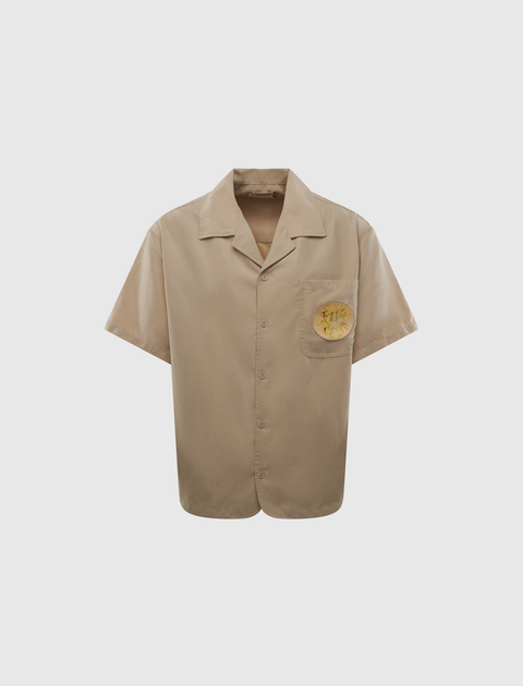 Beige short sleeve button-up shirt with yellow sun graphic on chest pocket, men's streetwear
