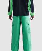 Back view of green cargo pants with wide legs and flap pockets, streetwear style