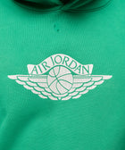 Green hoodie with white Air Jordan Wings basketball logo on chest