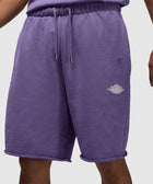 Men's purple fleece shorts with Air Jordan logo, elastic waist, and drawstring