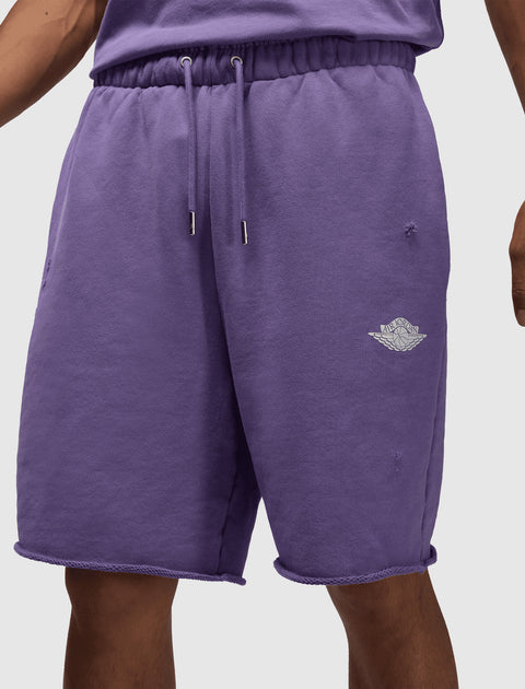 Men's purple fleece shorts with Air Jordan logo, elastic waist, and drawstring