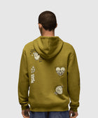 Man wearing olive green hoodie with graphic prints on back, streetwear fashion style