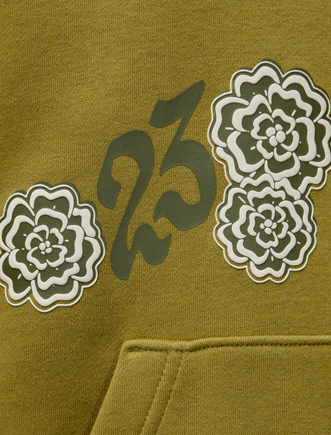 Olive green hoodie with white flower graphics and dark number print detail