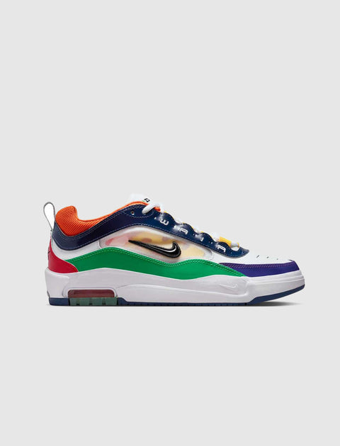 Colorful low-top sneaker with green, orange, red, purple, and navy details on white background