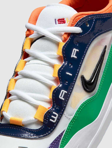 Close-up of colorful men's sneaker with white laces, neon accents, and embroidered lettering