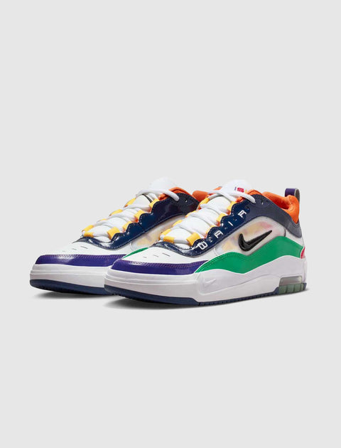 Colorful low-top Nike sneakers with white, green, purple, and orange accents on a white background