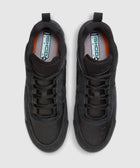 Top view of black suede and leather skate sneakers with padded collars and Ishod branding on insoles