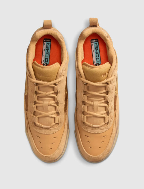Tan low-top sneakers with ISHOD branding, suede and mesh upper, top view
