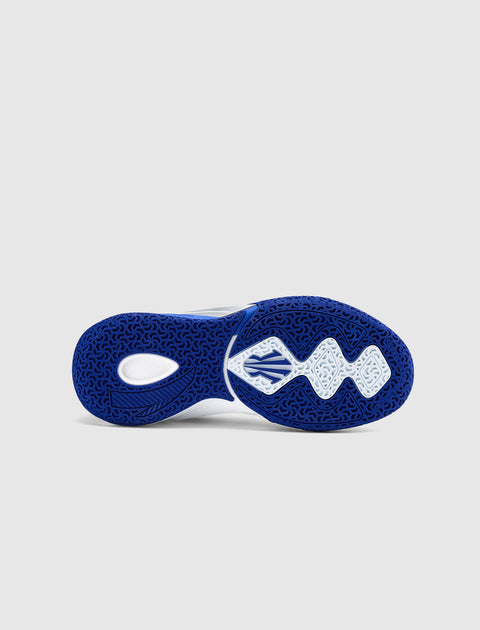 Blue and white sneaker outsole with textured grip pattern, isolated on light background.