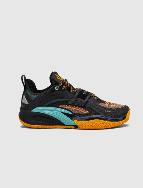 Black low-top sneaker with multicolor accents, orange sole, and patterned laces