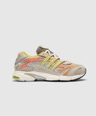 Beige mesh sneaker with yellow and coral accents, side view, chunky sole