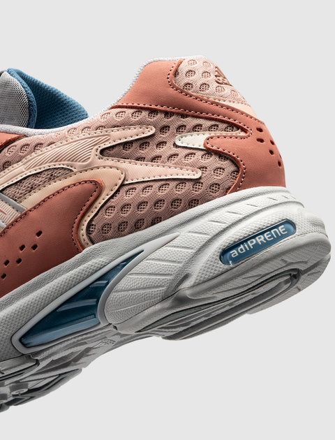 Closeup of pink and tan mesh sneaker with Adiprene sole and blue interior lining