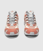 Pair of Adidas clay and grey sneakers with mesh and lace-up design, front view