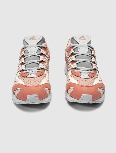 Pair of Adidas clay and grey sneakers with mesh and lace-up design, front view