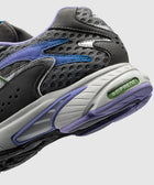 Close-up of grey mesh sneaker with purple and blue accents and adiPRENE sole detail
