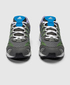 Gray mesh running sneakers with green accents, blue tongue, and white laces, front view
