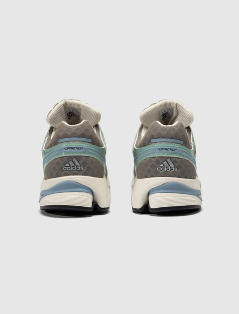 Rear view of gray and beige Adidas sneakers with blue accents and Formotion text on heel