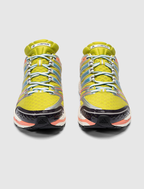 Pair of yellow and blue Adidas Adistar running sneakers with mesh and rubber details