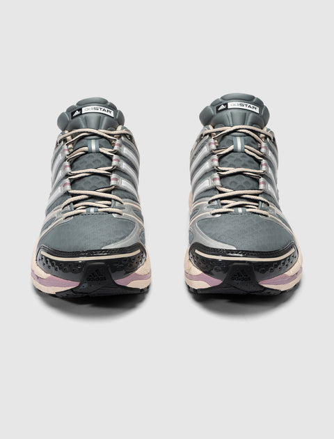 Gray Adidas adiSTAR Control 5 sneakers with mesh upper and reflective accents, front view