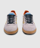 Lilac suede sneakers with yellow stripes, gum soles, black laces, orange interior, front view
