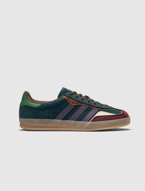 Men’s low-top suede sneaker in navy, green, purple, and burgundy with gum sole