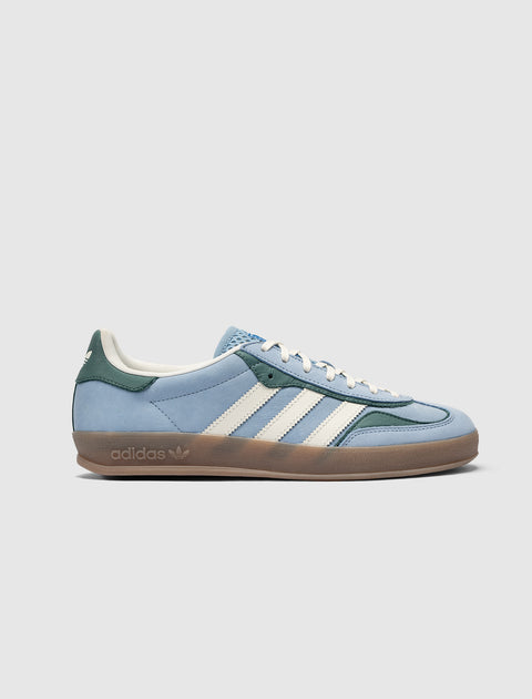 Blue and green suede sneaker with white stripes, gum sole, adidas logo on heel