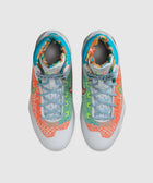 Colorful high-top basketball sneakers with mixed bright patterns and blue laces, top view