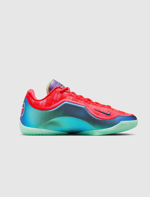 Men's low-top sneaker with vibrant red upper, gradient blue sole, and mint green outsole
