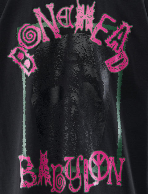 Black streetwear graphic tee with 'BONEHEAD BABYLON' neon pink and green lettering.