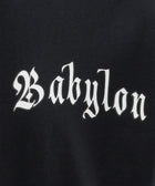 Black streetwear top with white Gothic 'Babylon' text graphic