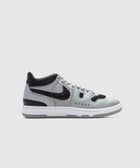 Gray and black men's streetwear sneaker with a white sole on a plain background
