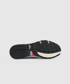 Black rubber outsole of a New Balance 992 sneaker with textured tread pattern