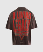Brown oversized men's streetwear t-shirt with bold red 'A Living Legacy' slogan on the back
