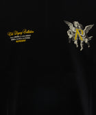 Black streetwear t-shirt with yellow text, angel graphic holding R, The Legacy Collection design