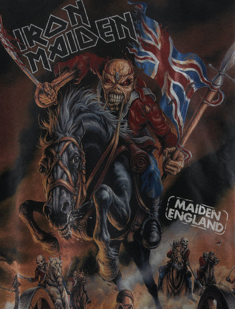 Iron Maiden graphic tee featuring mascot Eddie on horseback holding British flag in battle scene