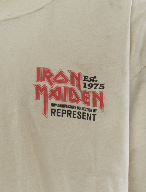 Cream graphic t-shirt with Iron Maiden Est. 1975 and 50th anniversary logo on chest
