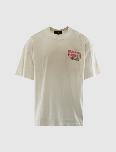 Beige oversized t-shirt with Iron Maiden Est. 1975 and Represent graphic on front chest