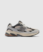 Men's grey and beige mesh suede sneaker with chunky sole, side profile on white background