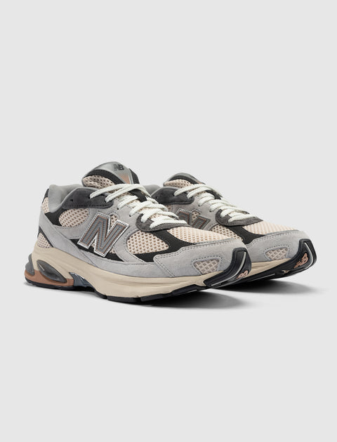 Light grey and beige mesh sneakers with suede overlays and chunky sole, lifestyle footwear
