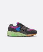 Multicolor men's sneaker with purple mesh, grey suede, green sole, and blue midfoot panel