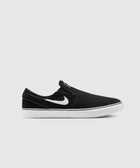 Black and white slip-on sneaker with white logo and white sole on a plain background
