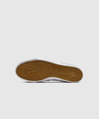 White sneaker with gum sole and herringbone tread pattern, streetwear footwear