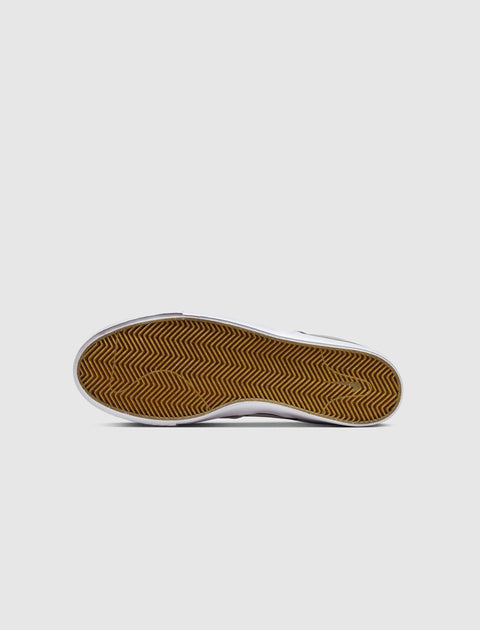 White sneaker with gum sole and herringbone tread pattern, streetwear footwear