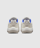 White and blue suede sneakers, rear view, featuring Nike SB logo on heel